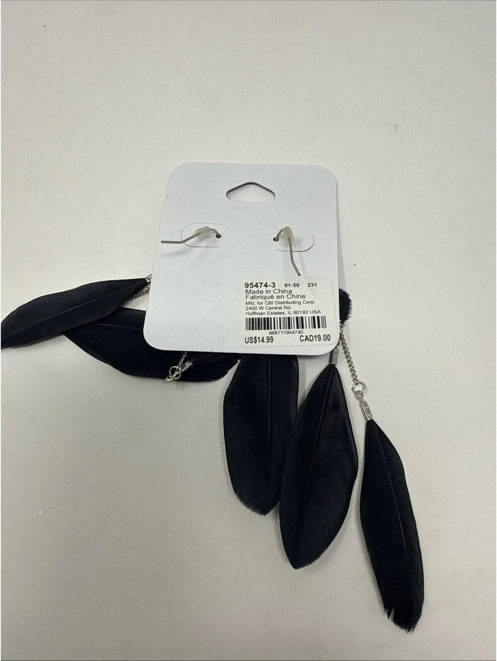 Claire’s Silver Diamond With Feather Earrings
